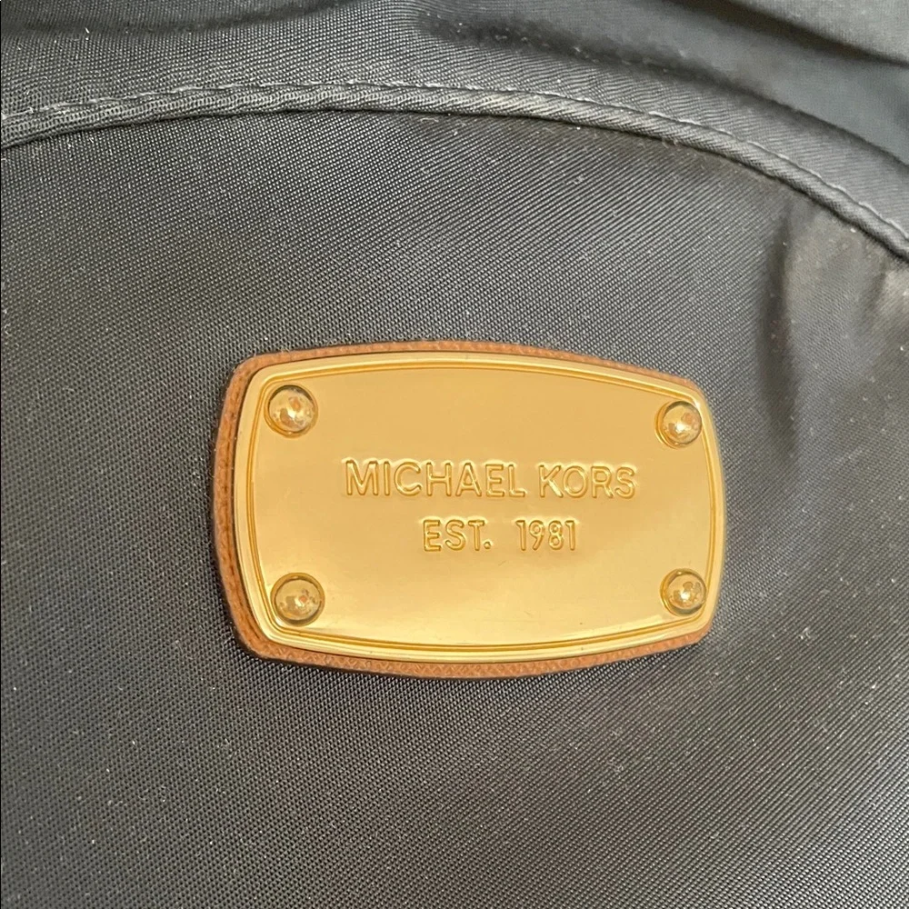 Elegant Michael Kors Navy and Tan Backpack
